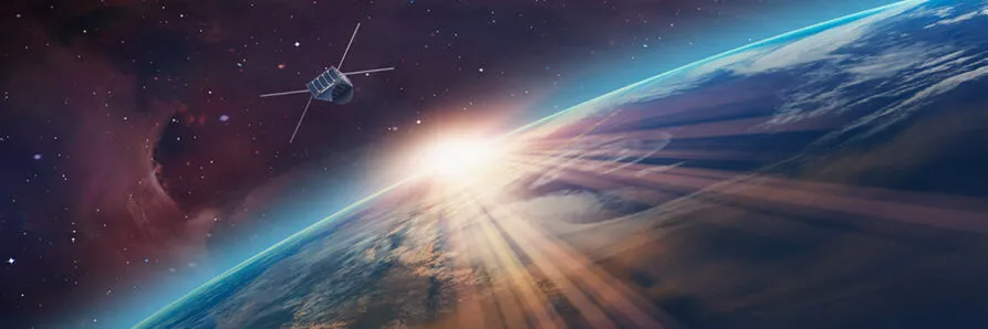 A small satellite orbits Earth against a cosmic backdrop filled with stars and nebulae. The sun rises over the planet’s horizon, casting golden light and long shadows across the atmosphere. This image symbolizes advanced space technology and satellite-based Earth observation.
