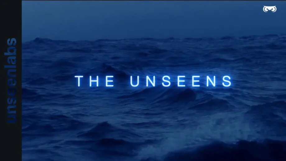A dark, moody ocean scene with rolling waves under a deep blue sky. In the center, the words "THE UNSEENS" glow in neon blue, creating an eerie and mysterious atmosphere.
