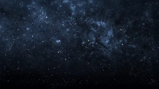 Star-filled deep space scene with a dense cluster of stars and cosmic dust, creating a dark blue galactic background.