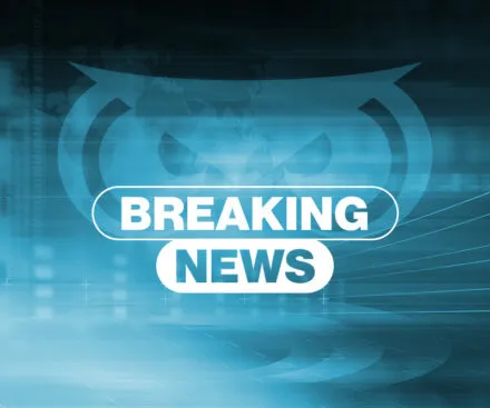 A digital graphic with a futuristic blue-toned design features the words "BREAKING NEWS" in bold white text, highlighted by a glowing outline. The background includes abstract technological elements, a subtle world map, and Unseenlabs' signature owl logo, conveying a sense of urgency and global impact.