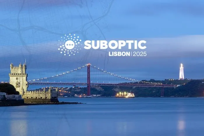 Banner for SubOptic Lisbon 2025 featuring the announcement: “New space-based Radio Frequency detection technology applied to maritime surveillance for subsea cable networks,” with a view of Lisbon’s 25 de Abril Bridge and the Cristo Rei statue.