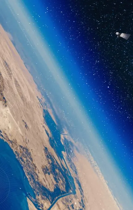 View of Earth from space showing the Red Sea region, including the Gulf of Suez and surrounding desert, with two satellites in orbit collecting RF data from ships at sea and coastal zones.