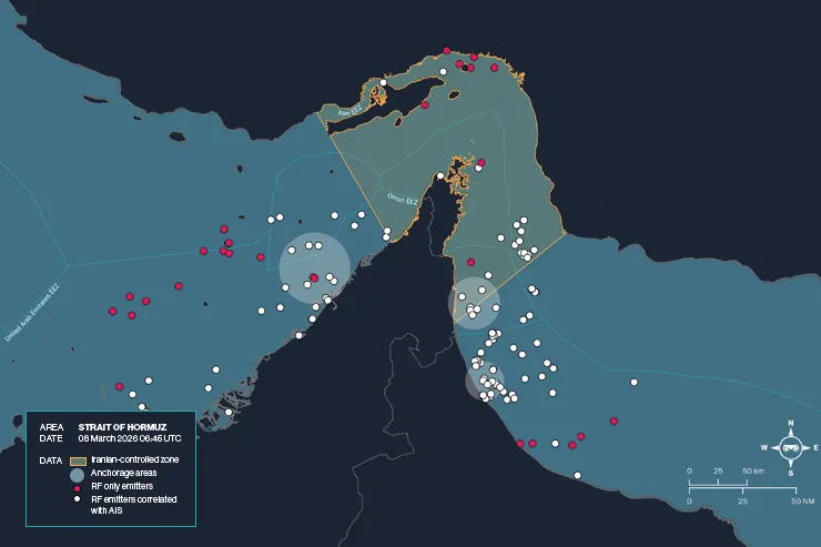 Map of the Strait of Hormuz on March 8, 2026, at 06:45 UTC, showing RF emitters detected by Unseenlabs. White dots represent RF detections correlated with AIS positions, while pink dots indicate RF-only detections. Compared to March 7, the map shows fewer AIS-correlated detections and more RF-only activity across the strait, particularly near Iranian-controlled waters.